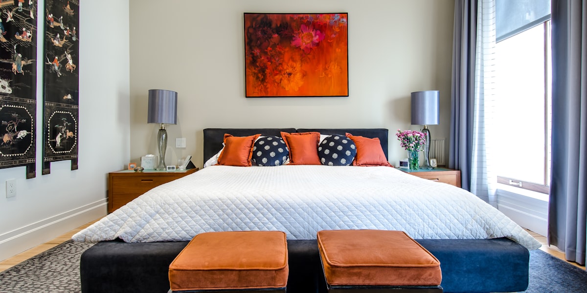 A calm, well-organised bedroom optimised for sleep